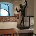 BRONZE STATUETTE OF DANCING SATYR