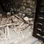 Skeletons of the Herculaneum people (copies), fishermen's warehouses, ancient Herculaneum beach